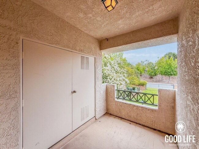Photo - SD: Bright 1BD/1BA Condo in Carmel Valley with Pool, Private Balcony & In-Unit Laundry Unit 302