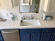 Sink is largest size cast iron from Koehler. Boasts Kingston Brass faucet. - 23705 Sea Breeze Ln Condo Unit 23705