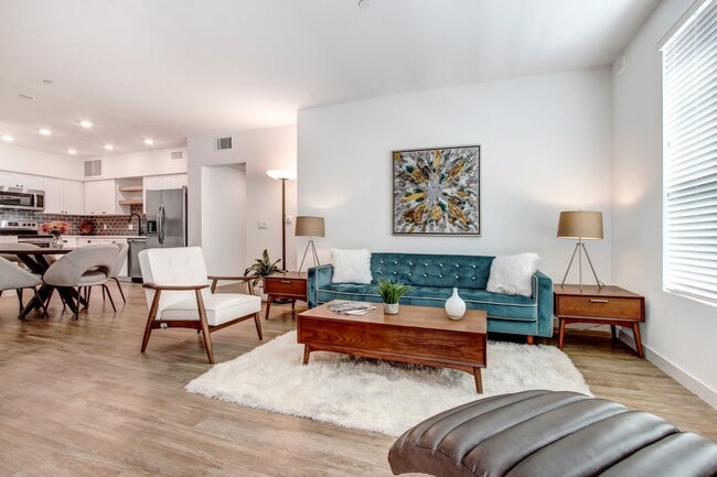 Open floorplan with wood-inspired floors throughout - Newhall Crossings