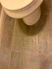 New bathroom floor tile - 5811 Whitnall Hwy Unit B
