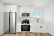 Photo - 521 W 78th St Townhome