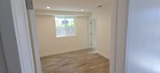 Downstairs bedroom, office - with a bathroom - 2 closets - 10925 Hesby St Apartments Unit 10925
