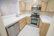Photo - COMING SOON! 2-Bedroom Condo with some Uti... Unit 211