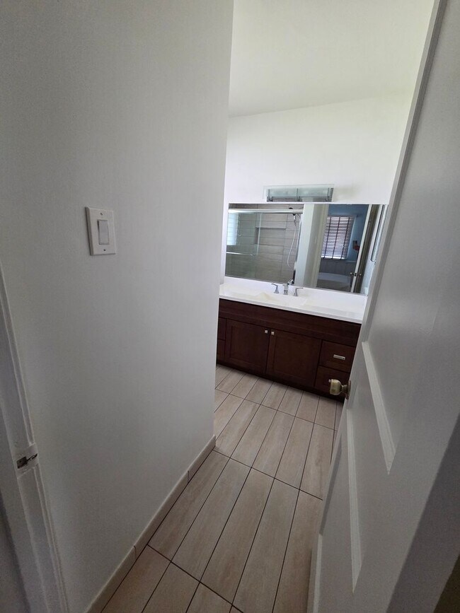 Photo - Spacious 3-Bedroom, 2.5-Bath Home with Pool – Fully Furnished!