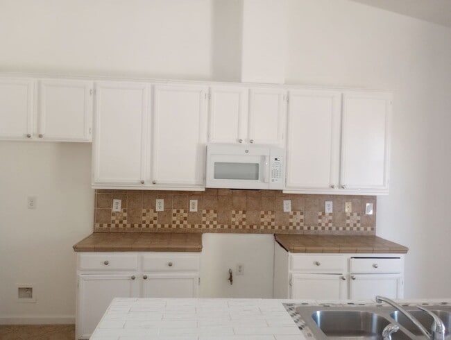 Photo - Spacious 4-Bedroom Home with Office, 3 Full Baths, and Modern Amenities