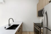 Photo - Top Floor, Laundry, Luxurious and Newly Built Unit 4605 Almayo Ave.  6