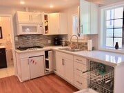 Kitchen with refrigerator, stove, microwave, and dishwasher - 1348 S Curson Ave House Unit 1348 S Curson Ave.