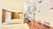 Photo - Spacious Two-Story Home with Three-Car Att...
