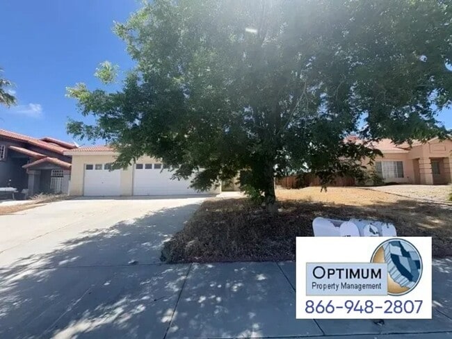 Photo - Spacious 4-Bedroom Home with Downstairs Bedroom & Brand-New Carpet