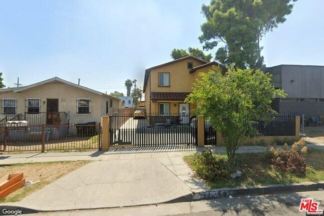Building Photo - 8820 Orchard Ave