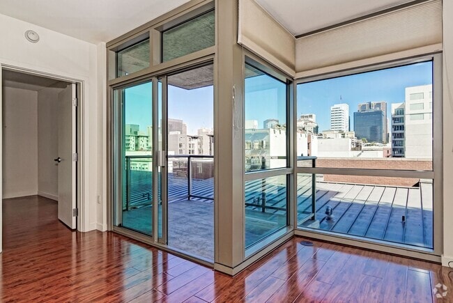 Building Photo - Modern Downtown Condo in Premier High-Rise...