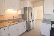 Photo - Recently Renovated, Single-Level 2-Bedroom Apartment with Small Fenced Yard. Unit O