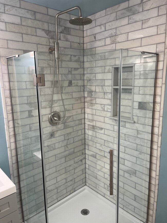 New oversized marble shower - 906 7th St