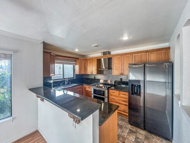 Photo - Beautiful 2BD/2BA W/ Private Balcony and In-Unit Laundry in Midway District!