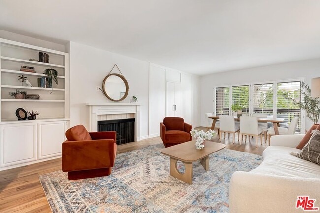 Building Photo - 5625 Cambridge Way Unit 203