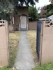 Gated entry walk and fenced front yard - 9343 Lomita Dr Townhome