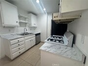 Photo - 6600 Warner Ave Unit 115