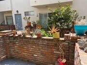 Cute patio that opens into the court yard - 1021 5th St Condo Unit 109