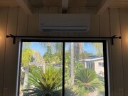 Split ac unit, above sliding door to the inviting backyard - 1947 Caddington Dr House