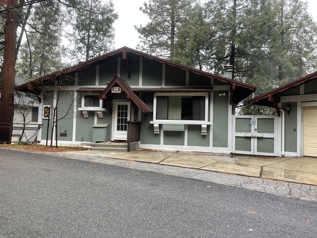 Photo - Large home level entry with garage.