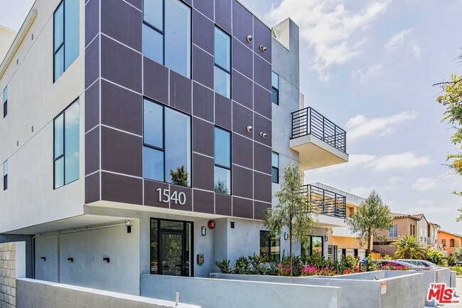 Building Photo - 1540 S Hayworth Ave Unit 202