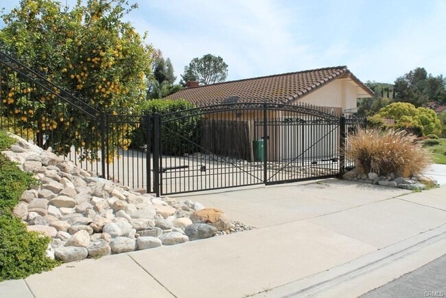 Photo - This incredible 4 bedroom single level home with private GATE entry