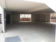 covered parking area. two tandem parking spaces - 3035-3041 Lawrence St