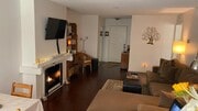 Living room w/ convenient gas fireplace - 3106 Summertime Ln Condo Unit 106