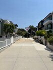 View from walkstreet towards park, basketball and tennis courts. - 312 18th St House