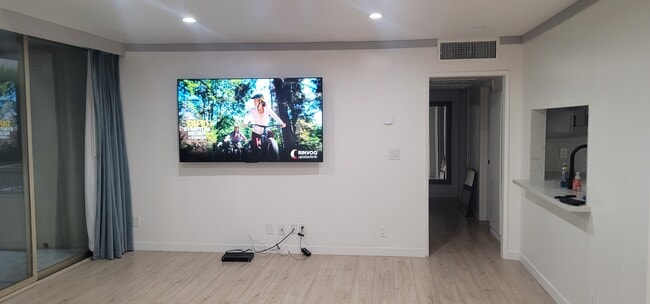 75" tv in Living Room - 1300 Midvale Ave Unit 307