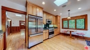Photo - Impeccably restored Craftsman Securely Gated and Hedged for Privacy!