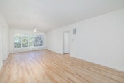 1BR, 1BA - 750SF - Living Room - Sunset West
