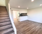 Main Living Space & Stair Case - 1002 Mission Dr Apartments Unit D