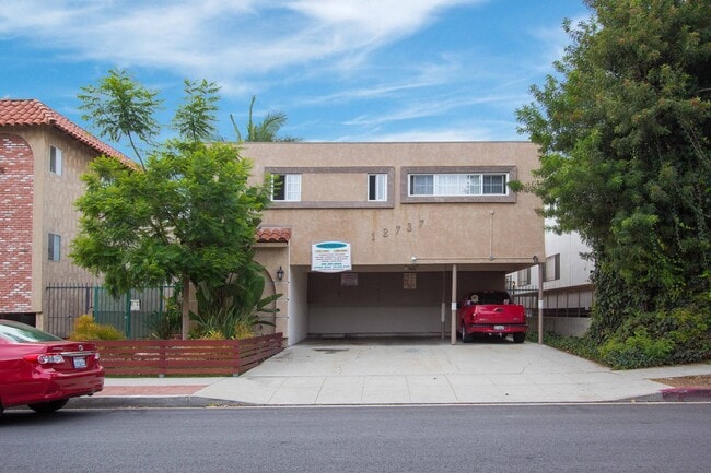 Building Photo - 12737 Pacific Ave Unit 02 Rental