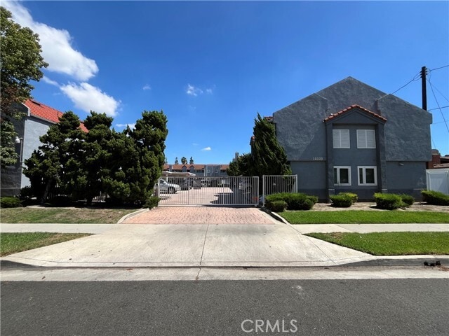 Building Photo - 14030 McClure Ave Unit 208