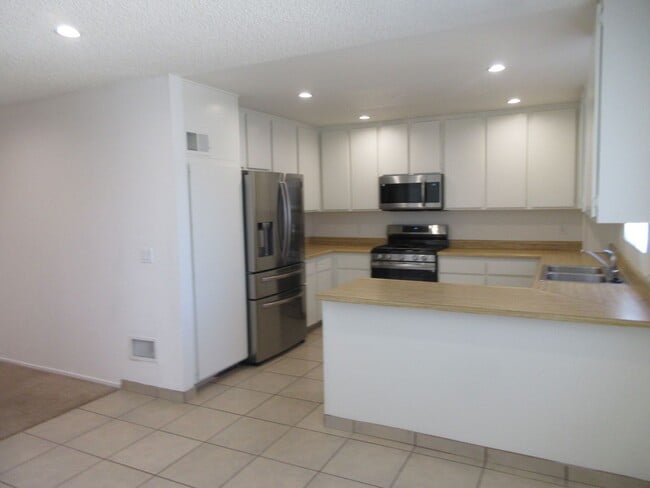 Photo - Duggan Property Management, Inc presents  Canoga Park - 3 Bedroom 2.5 Bath