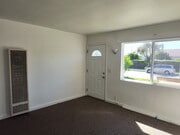 Front door/ living room - 1457 W 219th St Unit 1457-1/2