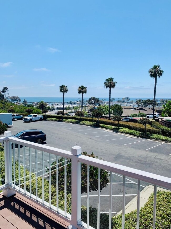 Photo - Perched above the stunning Dana Point Harbor, this gorgeous two-story condo offers breathtaking h...