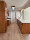 Kitchen View with Door to Attached Garage - 13784 Sycamore Tree Ln Townhome
