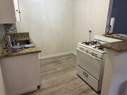 Kitchen - 717 E Santa Fe Ave Apartments Unit #5