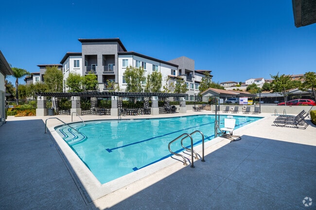 Shimmering Heated Pool and Spa - Tesoro Senior Apartments
