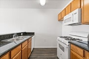 2BR, 1BA - 958SF - Plasencia - Kitchen - Villa Touran Apartments
