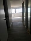 Into bedroom. Bathroom w toilet, shower & bath on left; closets on right - 8701 Delgany Ave Unit 204