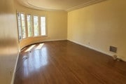 Living Room - 1233 S Orange Grove Ave Apartments Unit Front upstairs