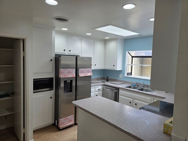 Photo - Single story 3 bedroom duplex right off El Camino Golf Course in the heart of Oceanside, recently...