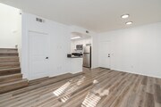 3BR, 3BA - 1,239SF - Living Room - Parkside Villas