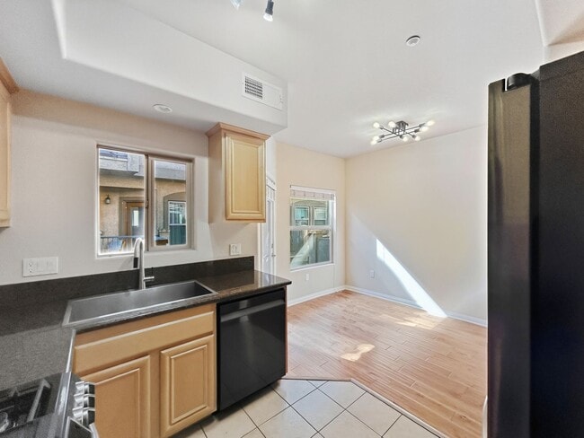 Photo - Spacious 2B/2.5BA Townhouse in North Park w/ Two-Car Garage & A/C!