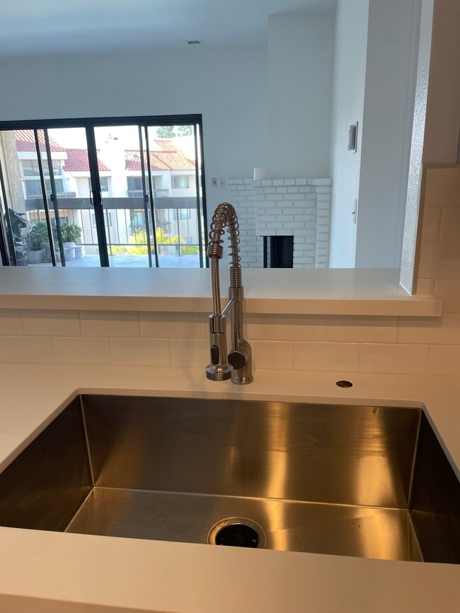 Brand-new kitchen sink/faucet - 8180 Manitoba St Unit 344