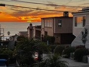 sunset from our walkstreett - 323 31st Pl Unit APT