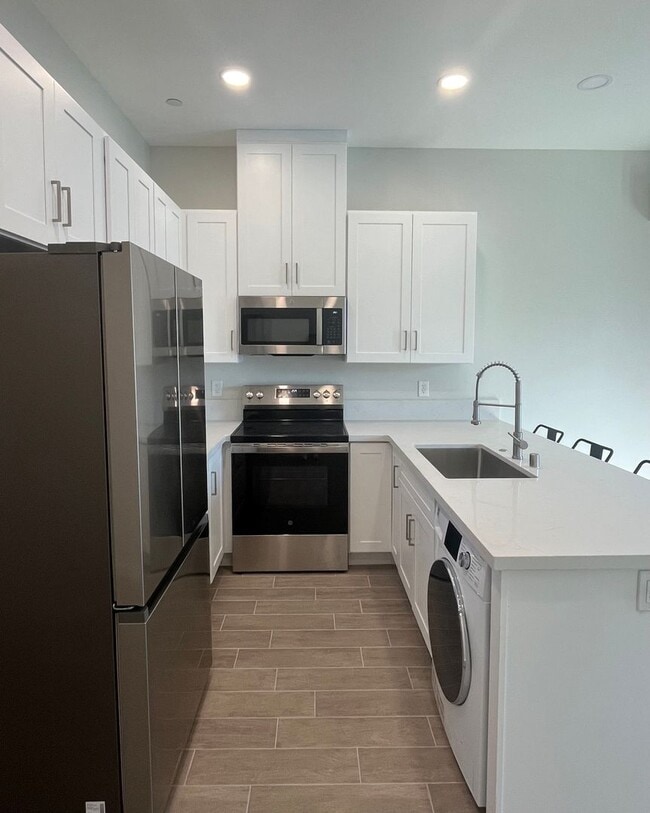 Building Photo - 17210 Newhope St Unit 1103-B
